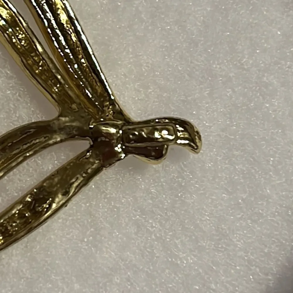 Elegant Golden AJC Brooch with Dual Hearts
